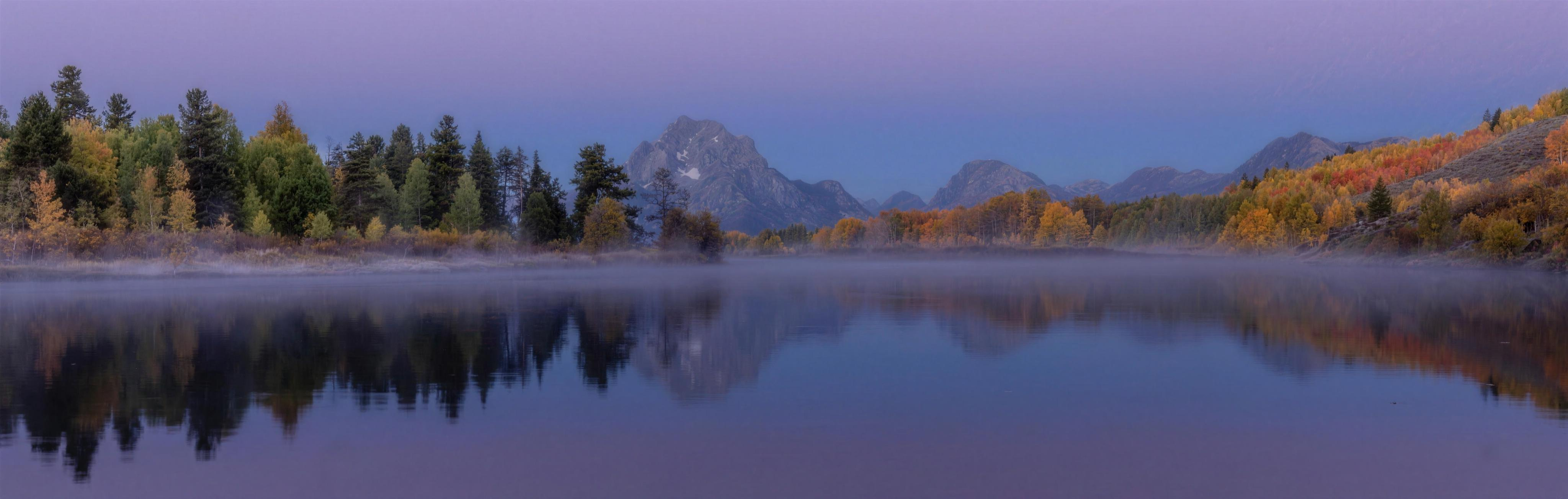 First Light Oxbow Bend panorama - Mount Moran morning mist Snake River fall aspens Grand Teton National Park